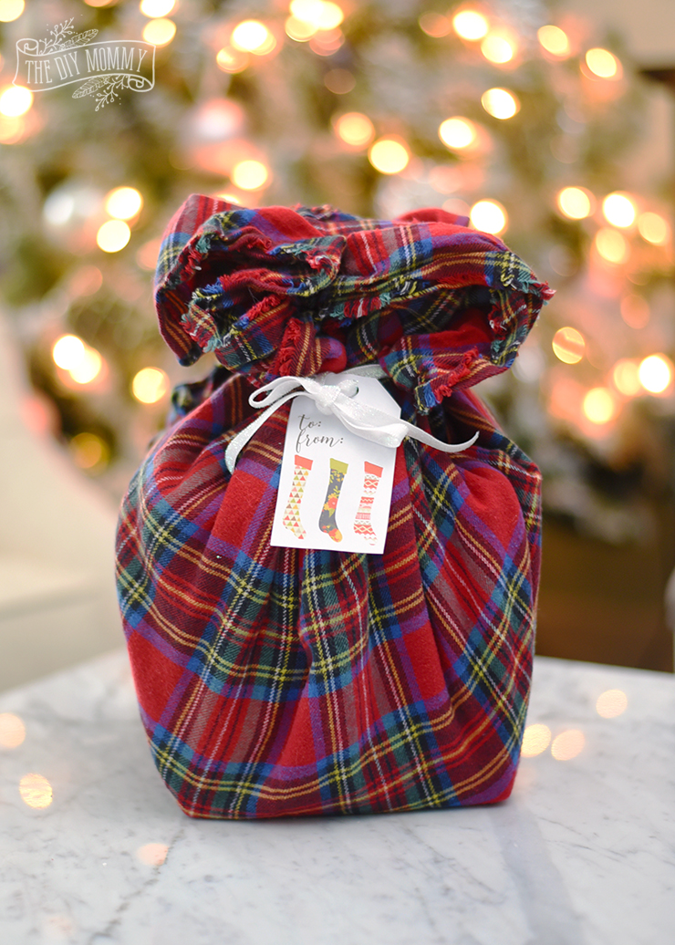 Christmas gift wrapping idea: wrap a gift in a blanket scarf!